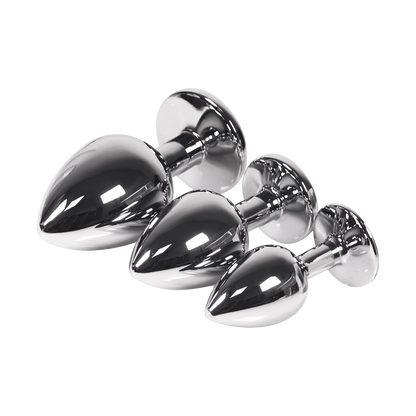 Set of silver butt plugs in three sizes on a transparent background