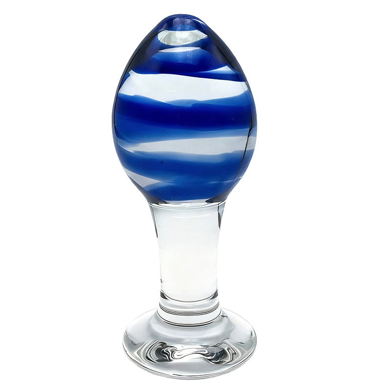 Glass anal plug with blue and clear striped design on a white background