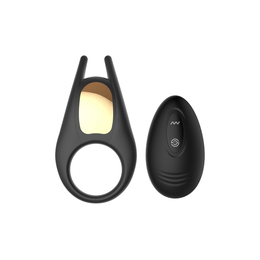 Black cock ring with a clit stimulator and a black remote control on a transparent background