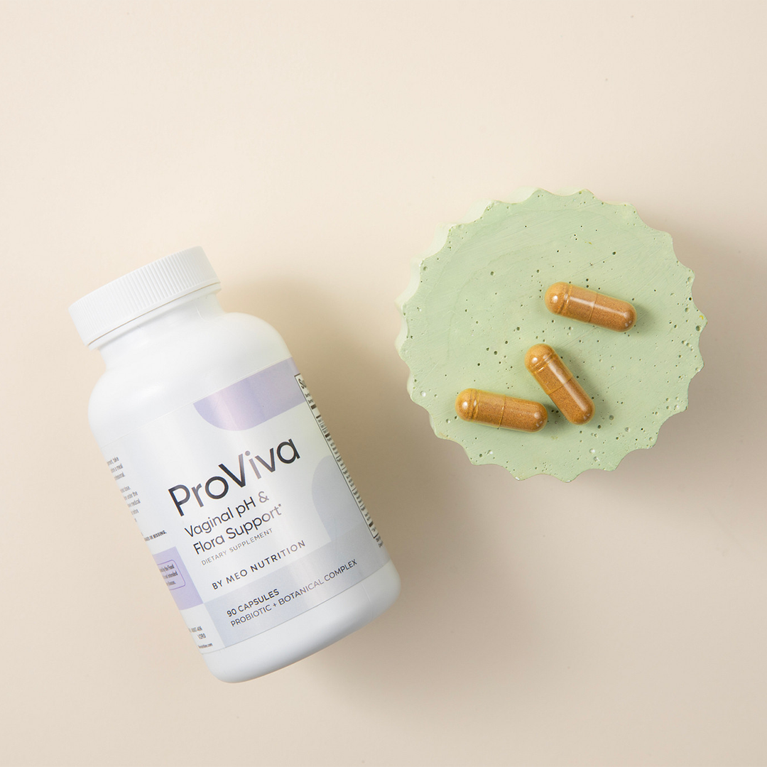 ProViva supplement bottle with capsules on a beige background